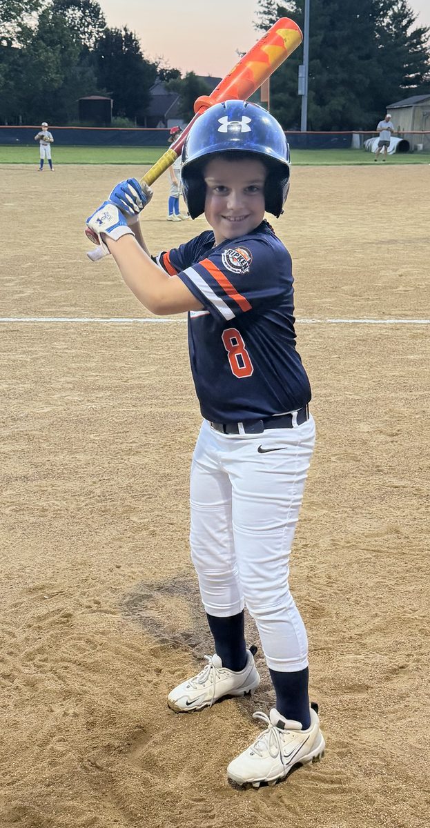 Bentley at bat in his number 8 jersey
